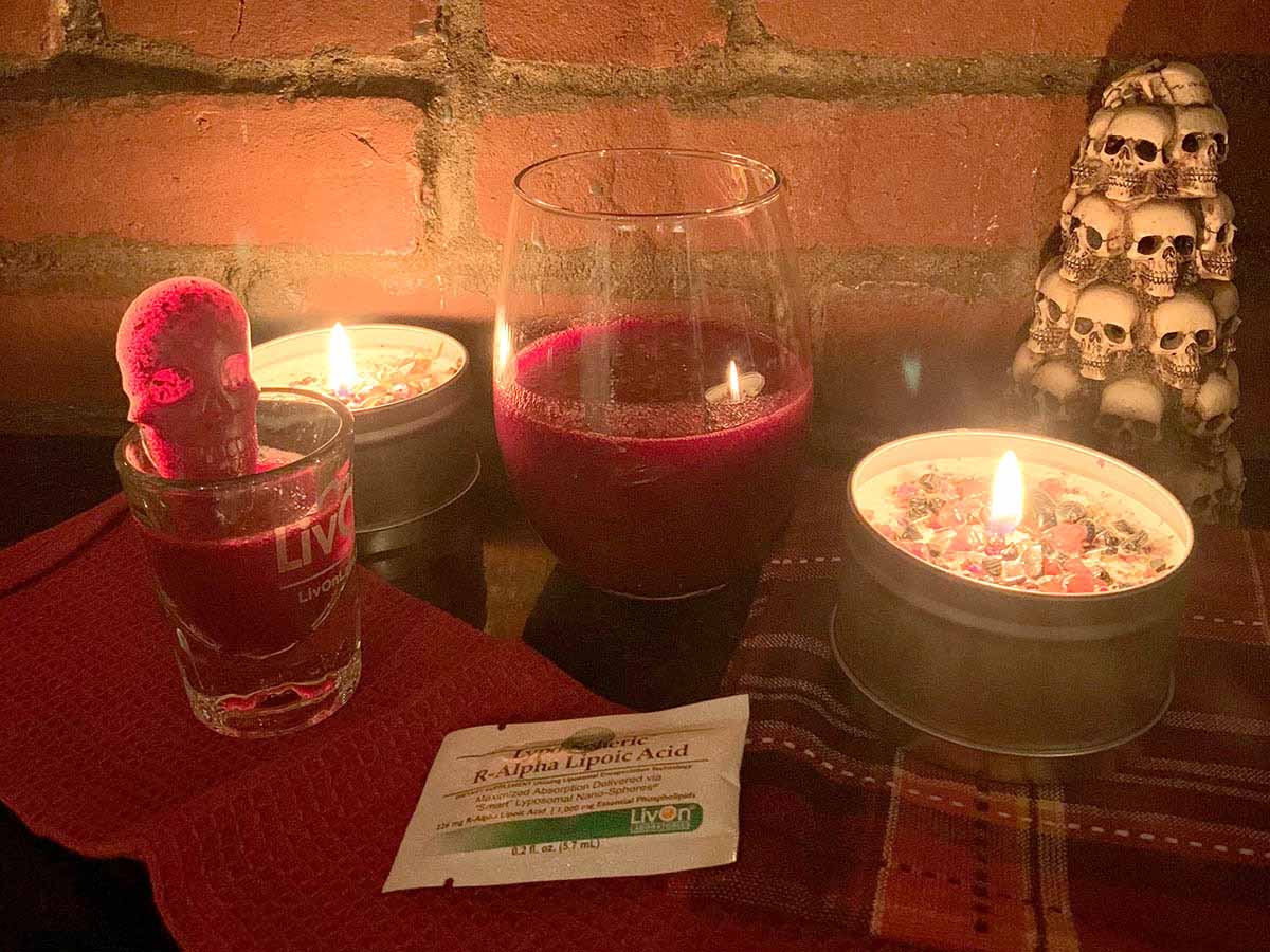 better than blood skin drink with lypo-spheric alpha lipoic acid packet, shot glass, and candles