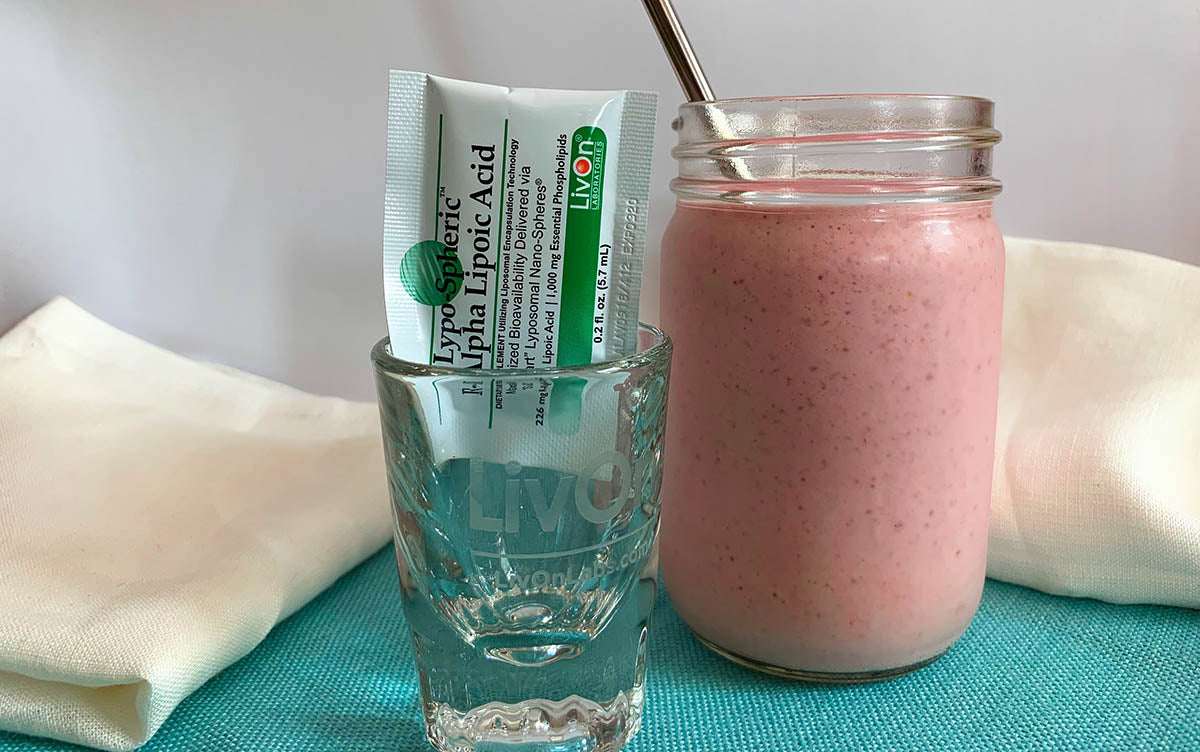 pre+post shake in mason jar with shot glass and lypo-spheric r-alpha lipoic acid