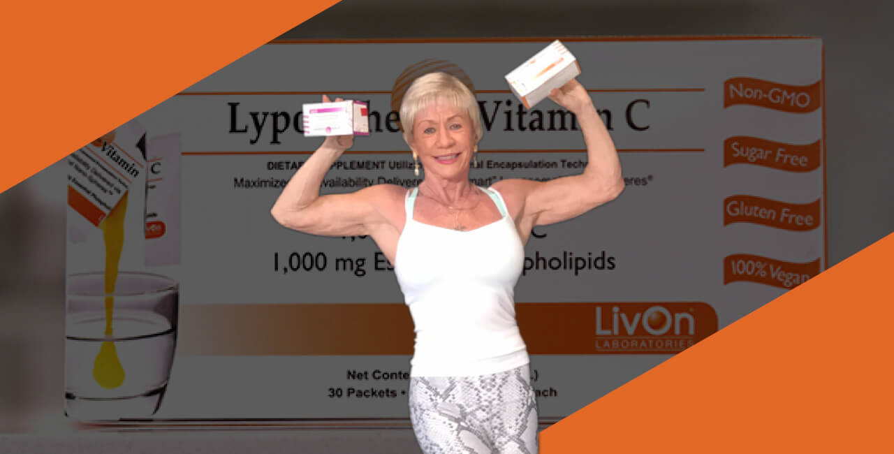 Iris Davis posing with cartons of LivOn products
