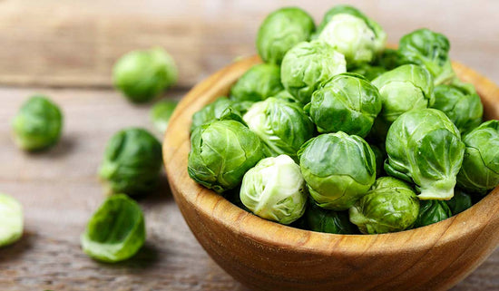 wooden bowl of brussels sprouts