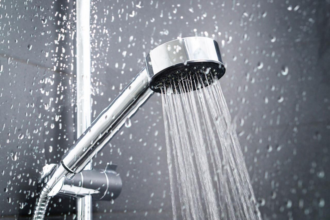 shower head with water streaming out