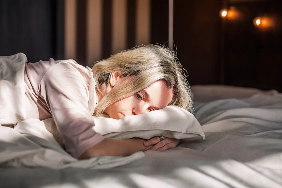 woman in menopause struggling with sleep