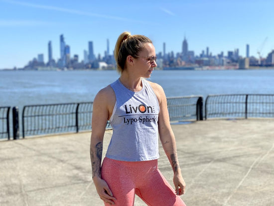 running expert Sabrina Wieser wearing a lypo-spheric tank top on the New Jersey waterfront