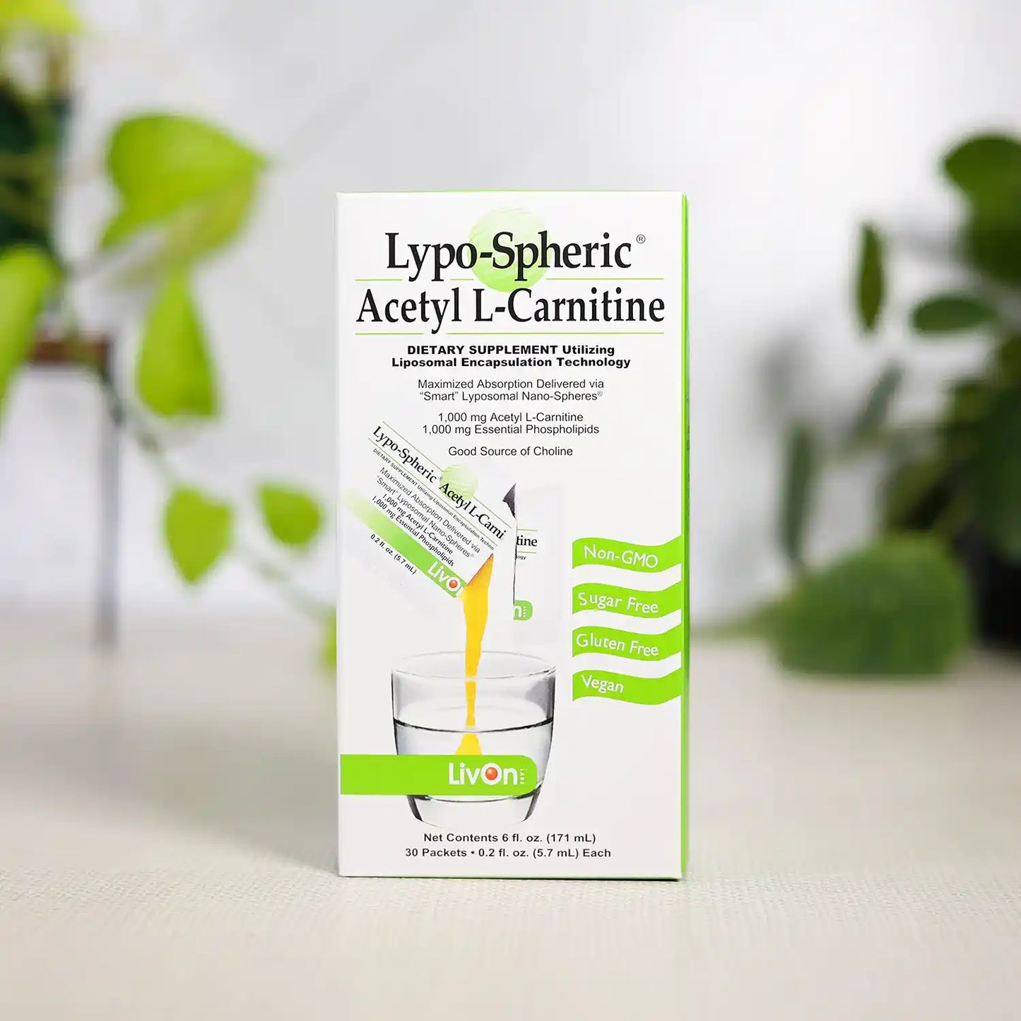 Lypo-Spheric Acetyl L-Carnitine carton with plants in background