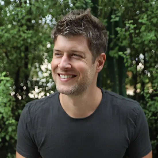 max lugavere smiling in front of trees
