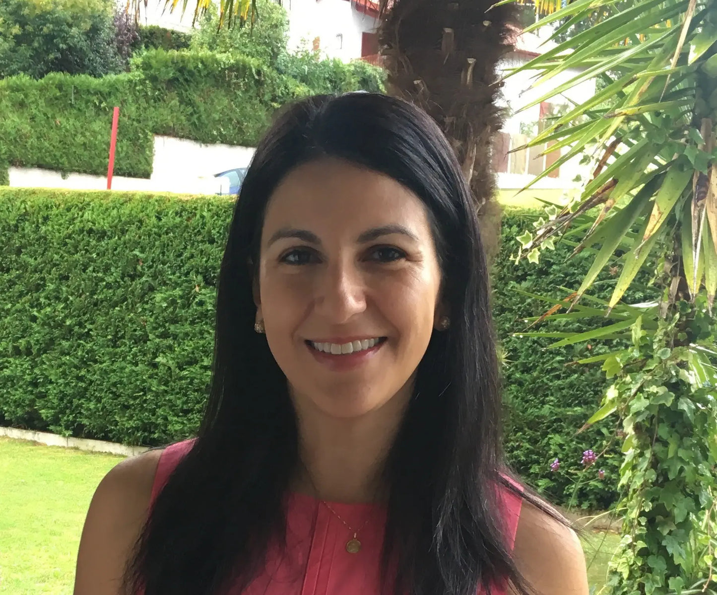 Paola Revelo smiling in an outdoor setting